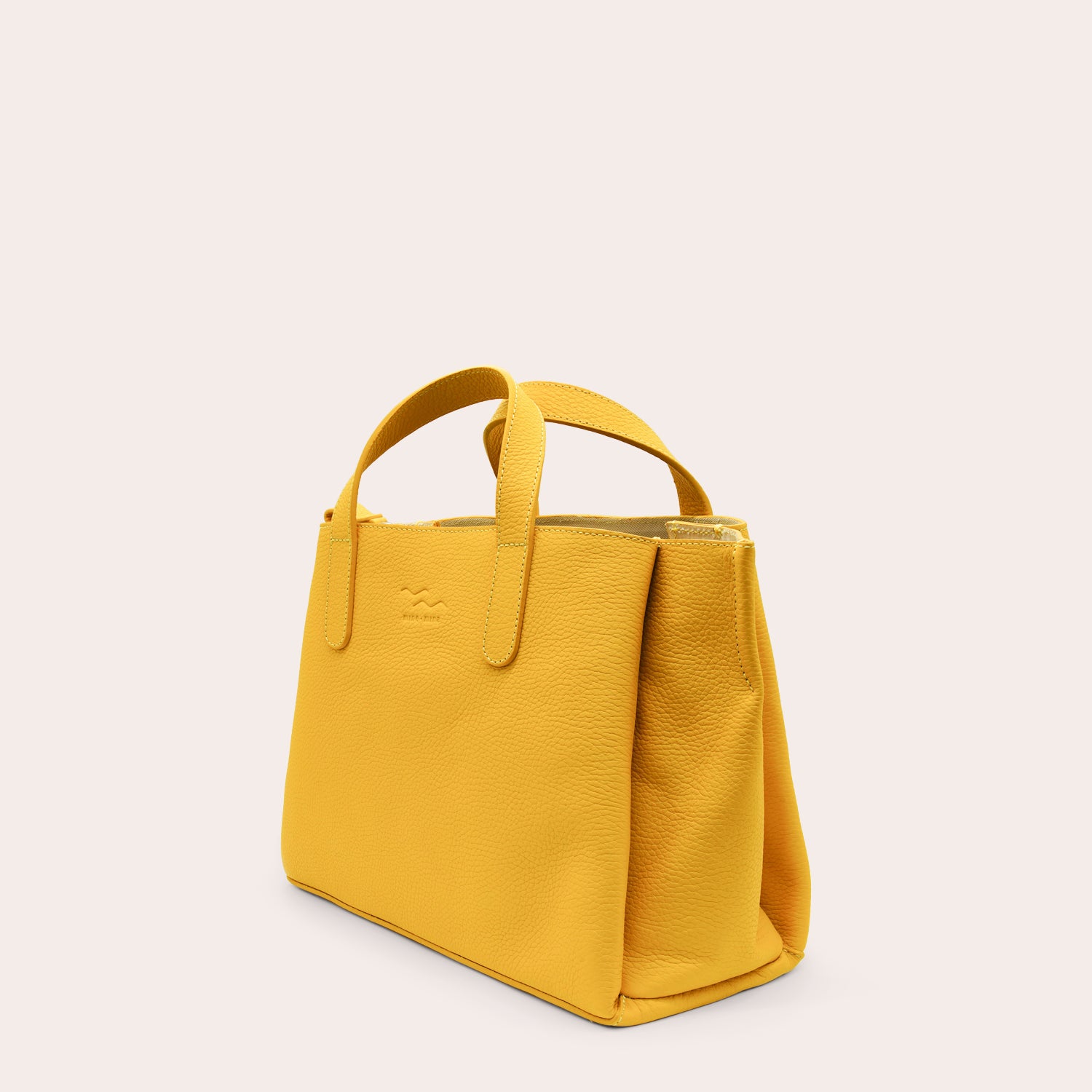 MADITA – unsere eckige Handtasche.